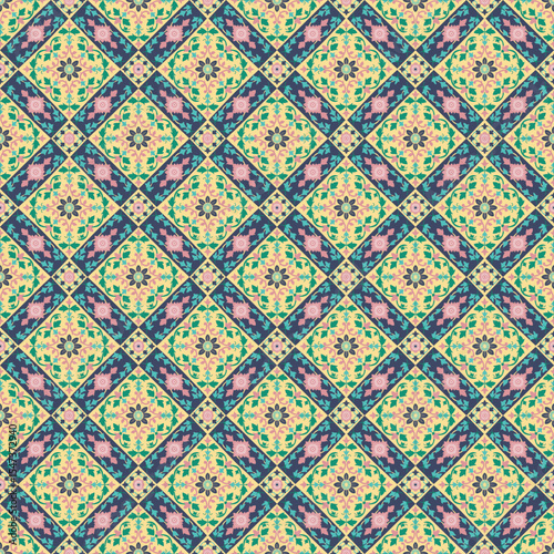 Colorful floral geometric seamless pattern with vintage tile-inspired design. Symmetrical ornament in Mediterranean style, perfect for wallpapers, fabrics patterns, background pattern