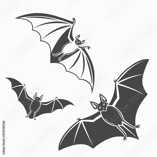 Three bats flying silhouettes halloween night creatures