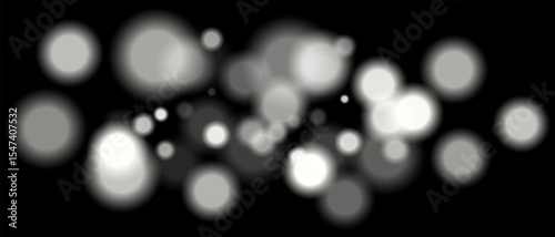 White blurred bokeh particles with varying size and opacity on black background. Abstract design element for festive or sci-fi scenes.