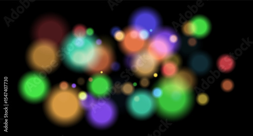 Multicolor blurred circles on dark backdrop. Bright glowing particles form warm atmospheric visual effect.