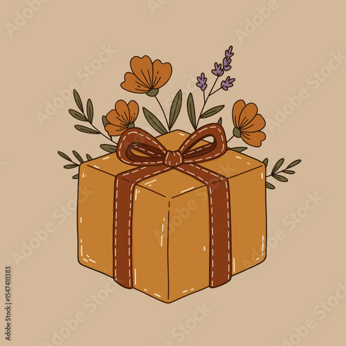 Gift box decorated with flowers and ribbon in warm colors  