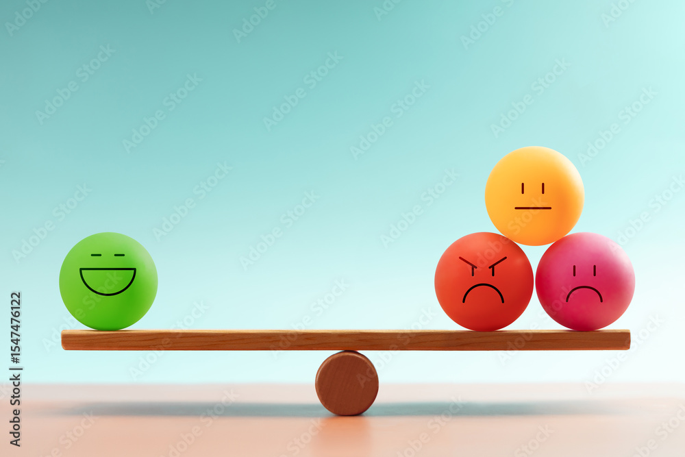 Φωτογραφία Colorful emotional faces balancing on a seesaw, symbolizing mental health and em