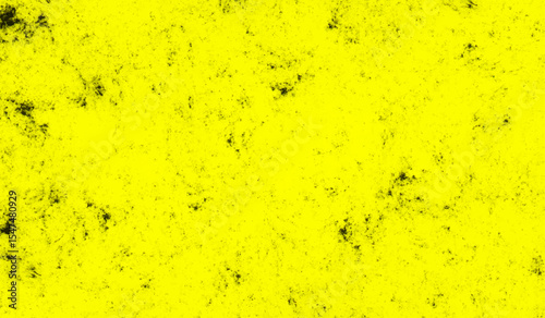 Scattered grunge texture yellow color cement plaster wall surface. Dark grunge texture on bright yellow concrete wall.