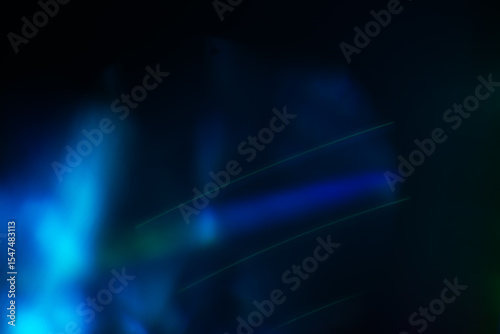 Colorful light leak on black background, abstract design with optical lens flare shot on a long lens