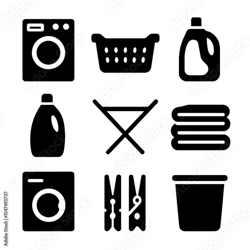 Laundry Essentials Icons. Solid style icons of laundry essentials: washing machine, laundry basket, detergent bottle, fabric
