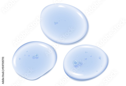 round drops of serum gel texture cosmetic productson a white background top view