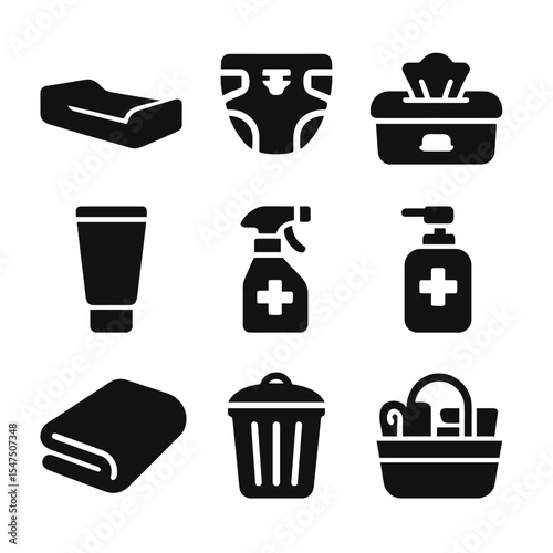 Diaper Station Icons. Solid, filled icons set of diaper changing station items: changing pad, diaper stack,