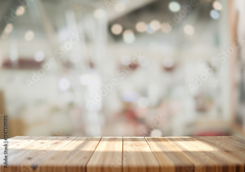 Wooden table with retail store blur