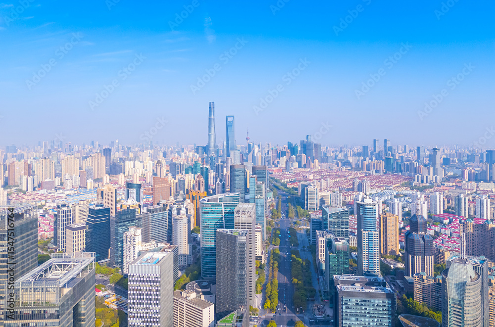 Fototapeta premium Aerial View of Shanghai skyscrapers with urban traffic.
