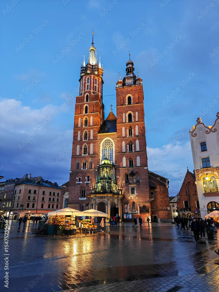 Fototapeta premium Amazing view of St. Mary's Basilica in Krakow, Poland. Sunset time