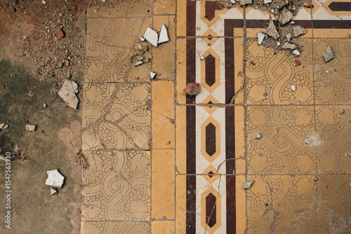Old shabby tiled floor in the castle