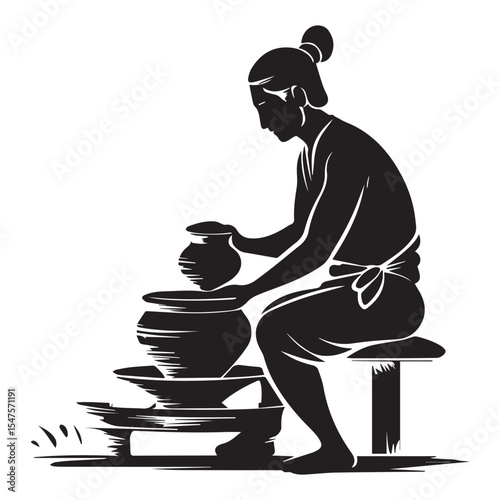 Silhouette of a potter shaping clay on a wheel
