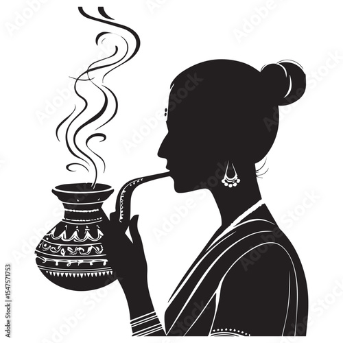 Silhouette of woman in sari drinking from pot