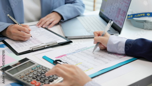 Expert woman asian female people review data number costing managerial account prepare monthly actual cost variance report income tax at audit office. ESG budget control ERP process service project.