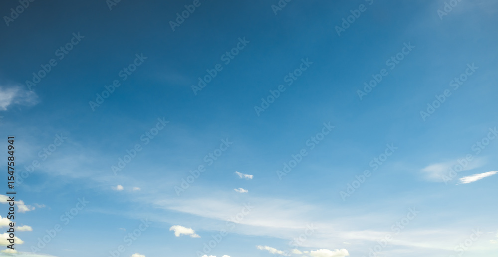 Fototapeta premium the sky is bright, the fluffy white clouds are quiet.