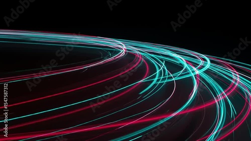 Vibrant light trails swirl through a dark night, creating dynamic patterns of movement and energy