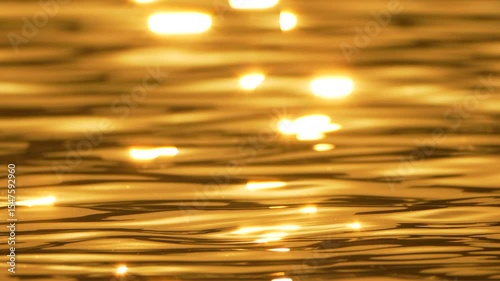 Water, Sun, Glare - Golden light reflecting on water surface.