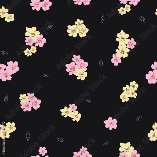 Seamless floral pattern with pink and yellow florals blossoms on black background for elegant textile and surface design



