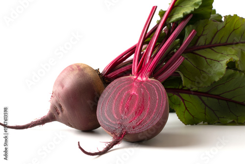 Fresh beets cut in half isolated on white background