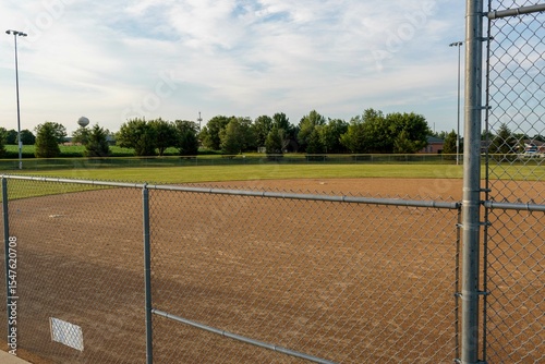 a view from the third baseline bleechers of the second baseball infield and outfield
