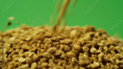Pouring Granules, Close-up Macro Green Screen Food Texture Abstract.