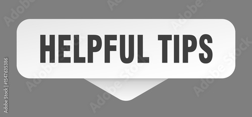 helpful tips sticker. helpful tips sign isolated on gray background