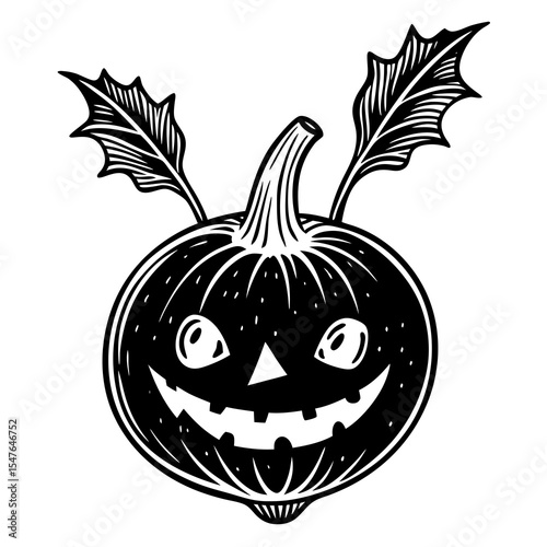 Halloween jackolantern pumpkin carved with a scary face and leaves