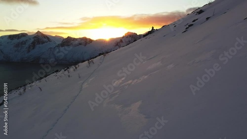 Breathtaking sunset view from Mount Segla on the Senja Peninsula in Northern Norway. A winter scene during the polar night