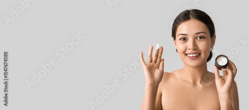 Beautiful Asian woman apply...