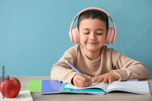 Cute little boy in headphon...
