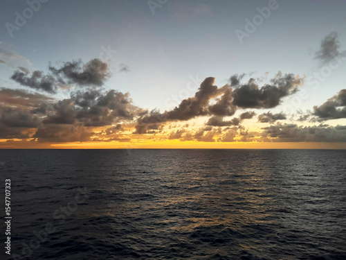 Sunset over the sea, cloudy sky. Atlantic ocean.