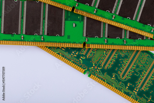 Various circuit boards with memory RAM modules chips are arranged neatly, intricate connections components.