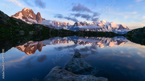 Colorful summer panorama of the Lac Blanc lake with Mont Blanc (Monte Bianco) on background, Chamonix location. Beautiful outdoor scene in Vallon de Berard Nature Reserve, Graian Alps, France, Europe.