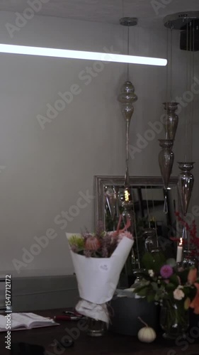 Woman Enjoying the Scent of a Flower