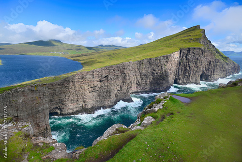 Trælanípa Sea Cliffs and Lake Leitisvatn in the Faroe Islands.