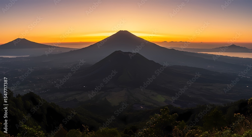 Fototapeta premium Majestic Sunrise over Volcanic Mountain Range