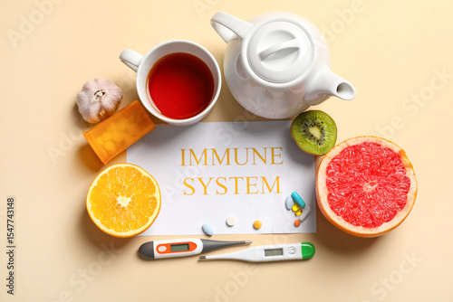 Immune system health with natural remedies, citrus fruits, tea, and medical supplies for wellness