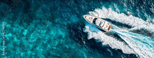 Yachting adventure Luxury boat cruising the turquoise ocean, creating white wakes in a paradise setting.