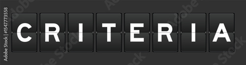 Black color analog flip board with word criteria on gray background