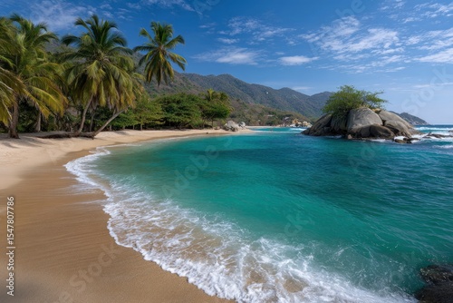 Tropical beach with palm trees sandy shore clear turquoise sea and rocky islet under a bright blue sky with scattered clouds