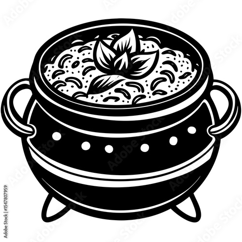 Black cauldron with herbs isolated on a white background