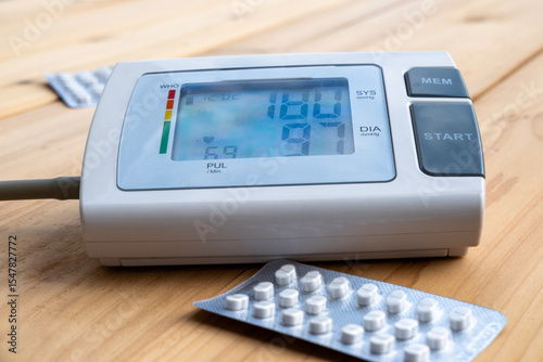 Digital device measuring blood pressure and pulse, ideal for personal health and hypertension monitoring