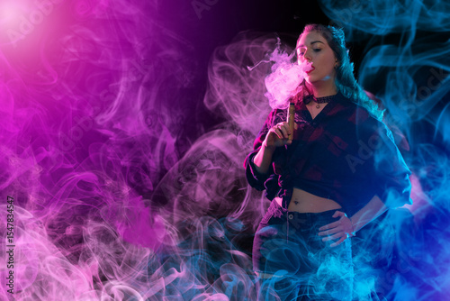 Woman smoking vape. Girl va...