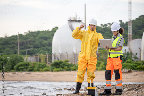 Environmental Scientists Collecting Water Samples for Analysis, Researchers Testing Water Quality at a Lake or Coastal Area, Water Pollution Control, Scientists at Work in the Field