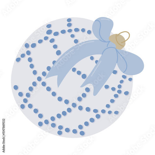 Elegant Christmas ornament with dotted pattern and decorative bow in pastel blue tones. Concept of holiday decoration, festive spirit and seasonal celebration