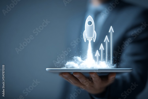 Vibrant photo of businessman holding an icon of a rocket launch with upward arrows and a laptop, representing the idea to start or teach a digital marketing online course on a.