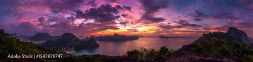8k Panoramic view of a colorful sunset over the sea with mountains in Thailand, banner 