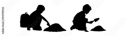 A silhouette image of two children engaged in a playful activity involving sand.