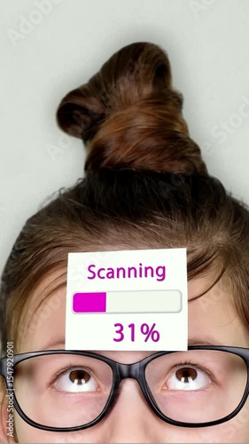 Animation of Scanning process takes place on the sticker. A smart teenager face, a child in glasses, with a sticker on his forehead.