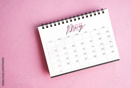 Wallpaper Mural Top view of May 2026 desk calendar on pink pastel background. Torontodigital.ca